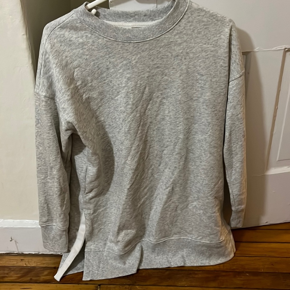 Long cotton gray sweater with small opening on the side